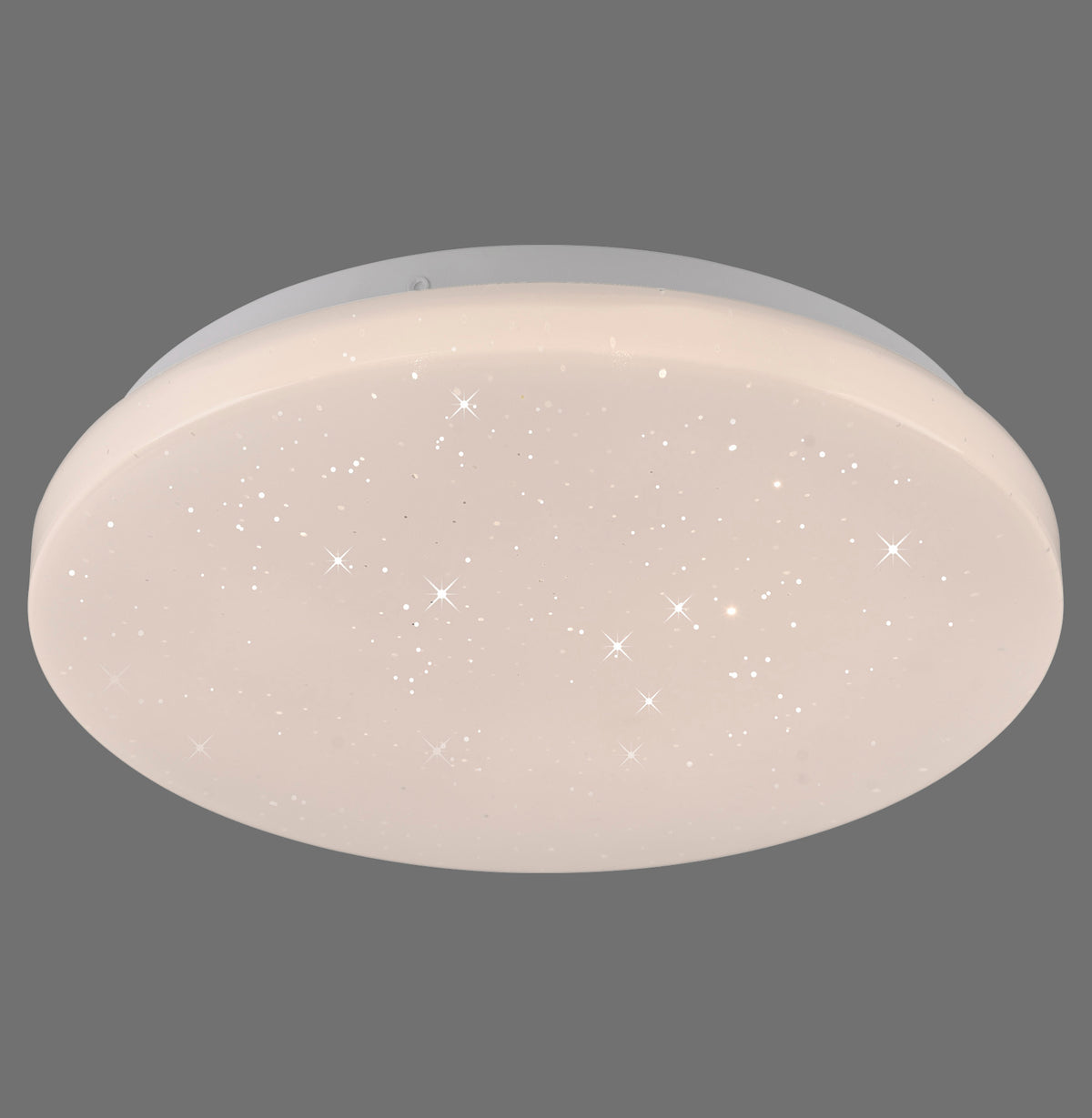 Plafonnier ovale blanc vu de face, diffuseur parsemé de petits points lumineux