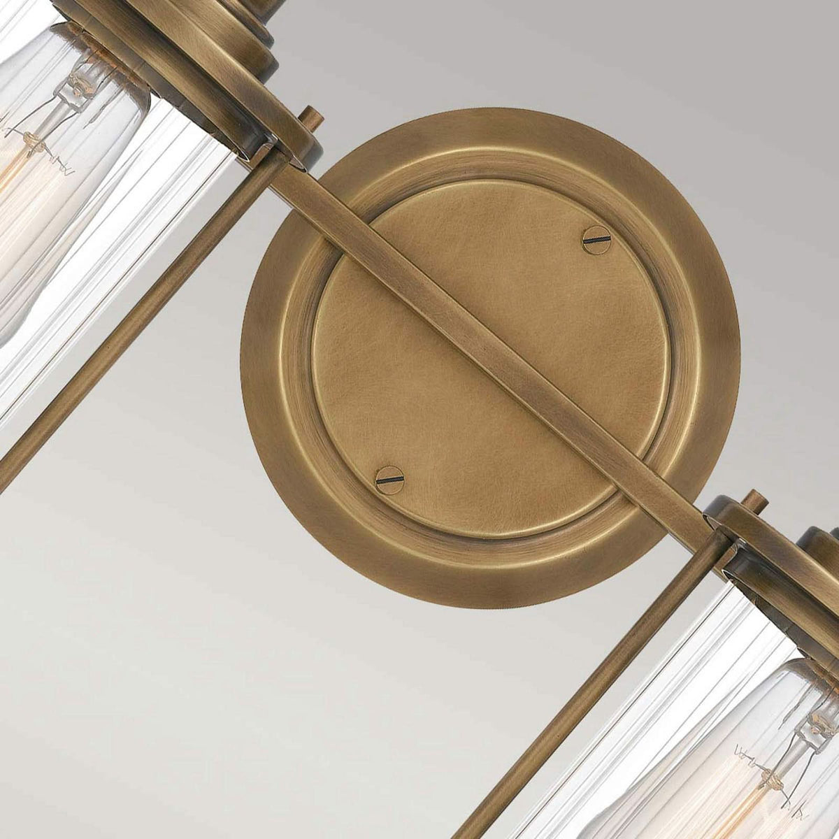 Applique murale Riggs IP44 en verre, laiton ancien et transparent, hauteur 21,8 cm, largeur 38,1 cm