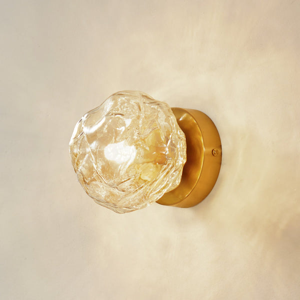 Applique murale Piatra en verre, ambre transparent et laiton, Ø 15,5 cm