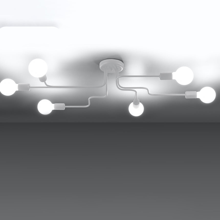 Luminaire allumé dans l'obscurité, six globes diffusant une lumière chaude et égale