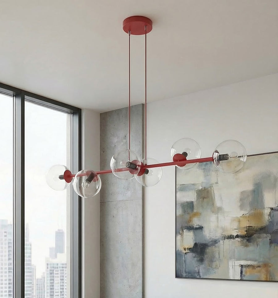 Vue en situation près d'une fenêtre, structure rouge et globes transparents