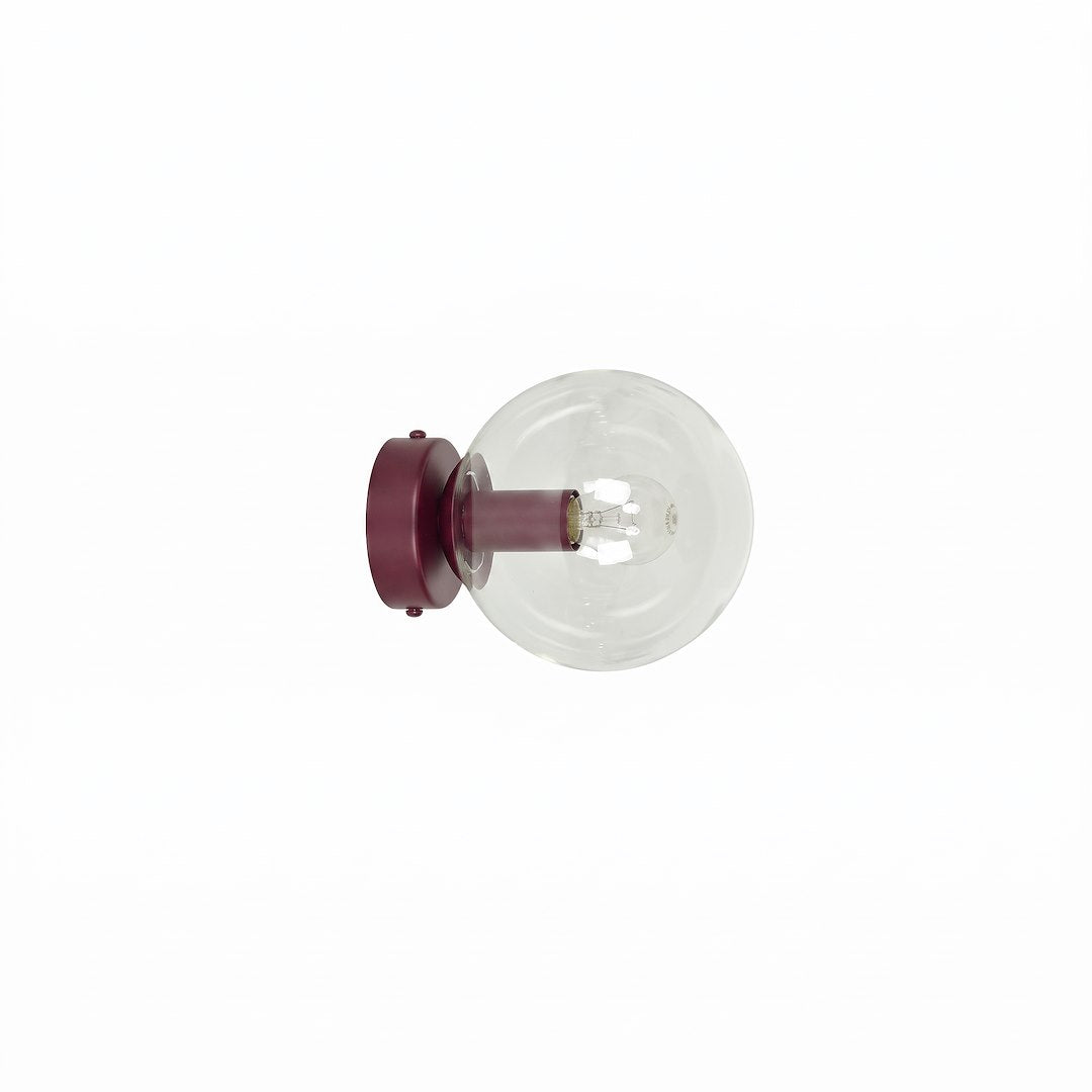 Applique murale bordeaux avec globe en verre transparent et ampoule visible