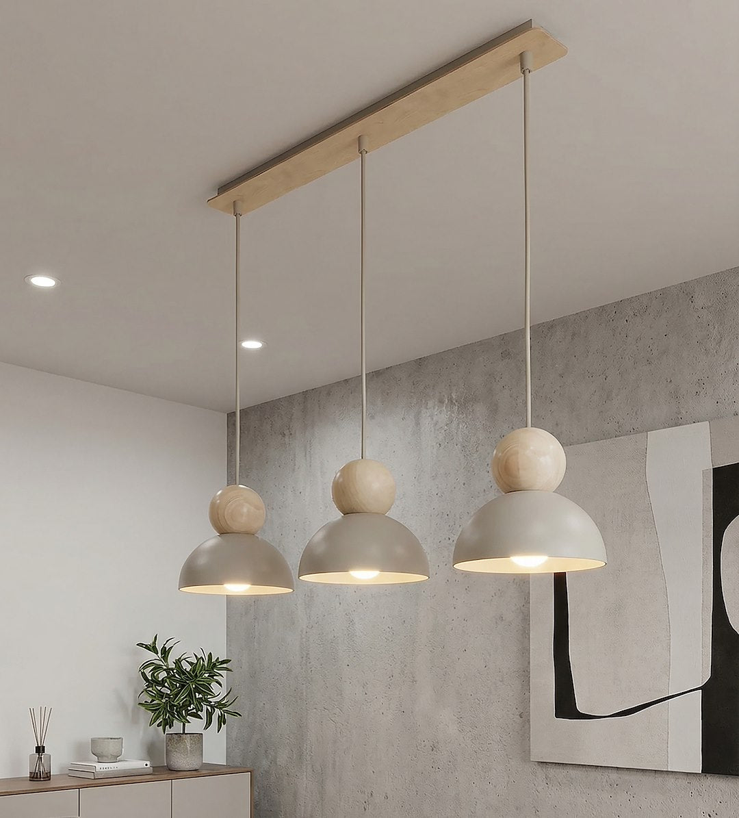 Mise en ambiance au-dessus d'un buffet devant un mur béton