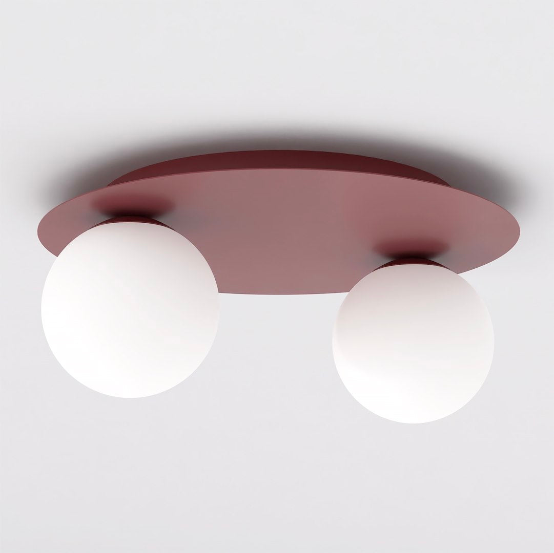 Photo produit du plafonnier bordeaux avec deux globes en verre blanc, vue de dessous.