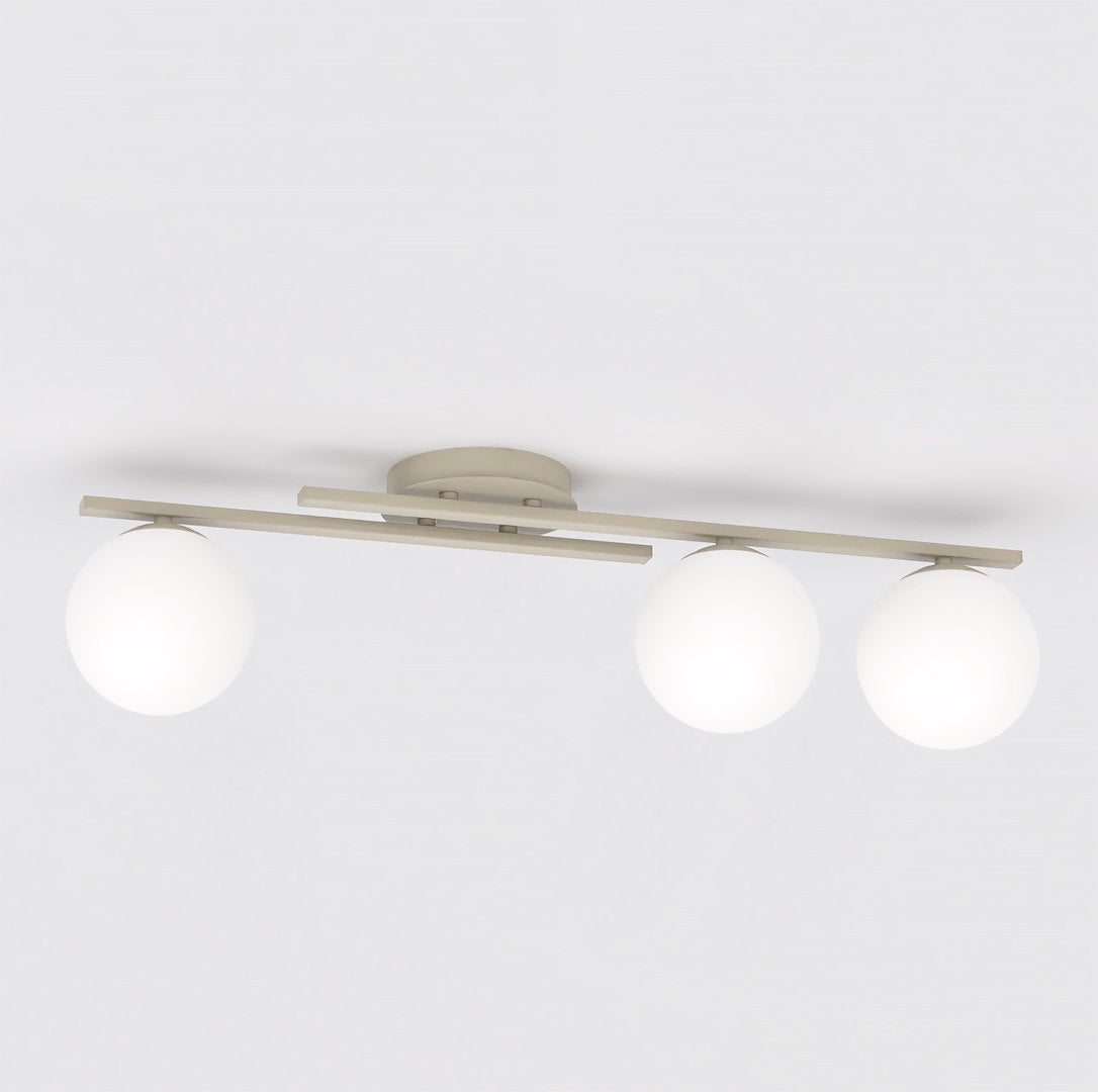 Vue de face, barre fine beige et trois globes blancs fixés au plafond