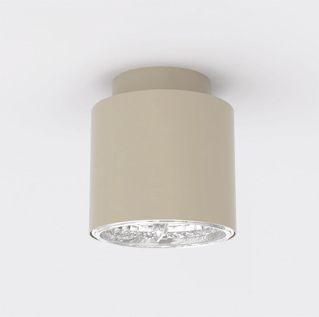 Plafonnier cylindrique beige vu de face sur fond blanc neutre