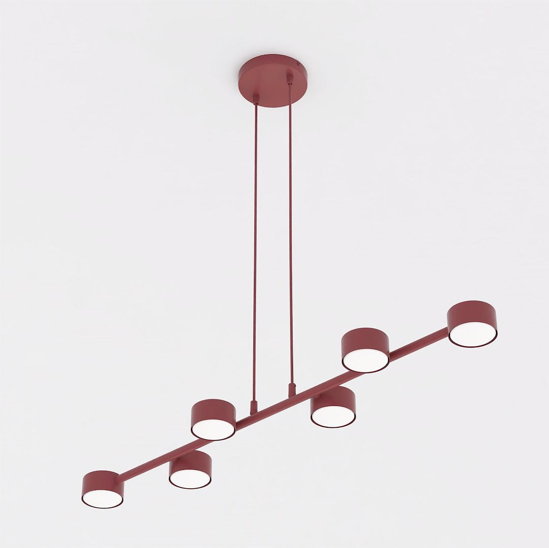 Suspension vue de biais montrant la barre et ses six cylindres rouges