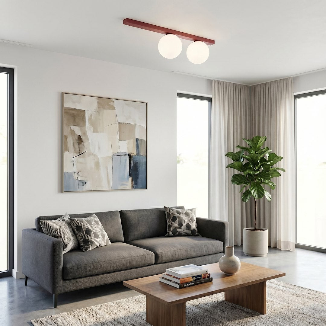 Mise en ambiance dans un séjour contemporain avec canapé gris et grand tableau
