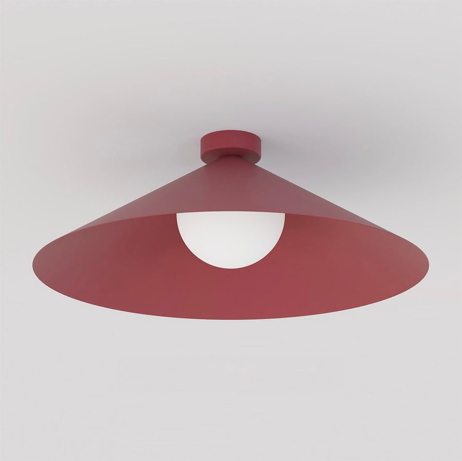 Vue en contre-plongée montrant le diffuseur en verre blanc sous l'abat-jour
