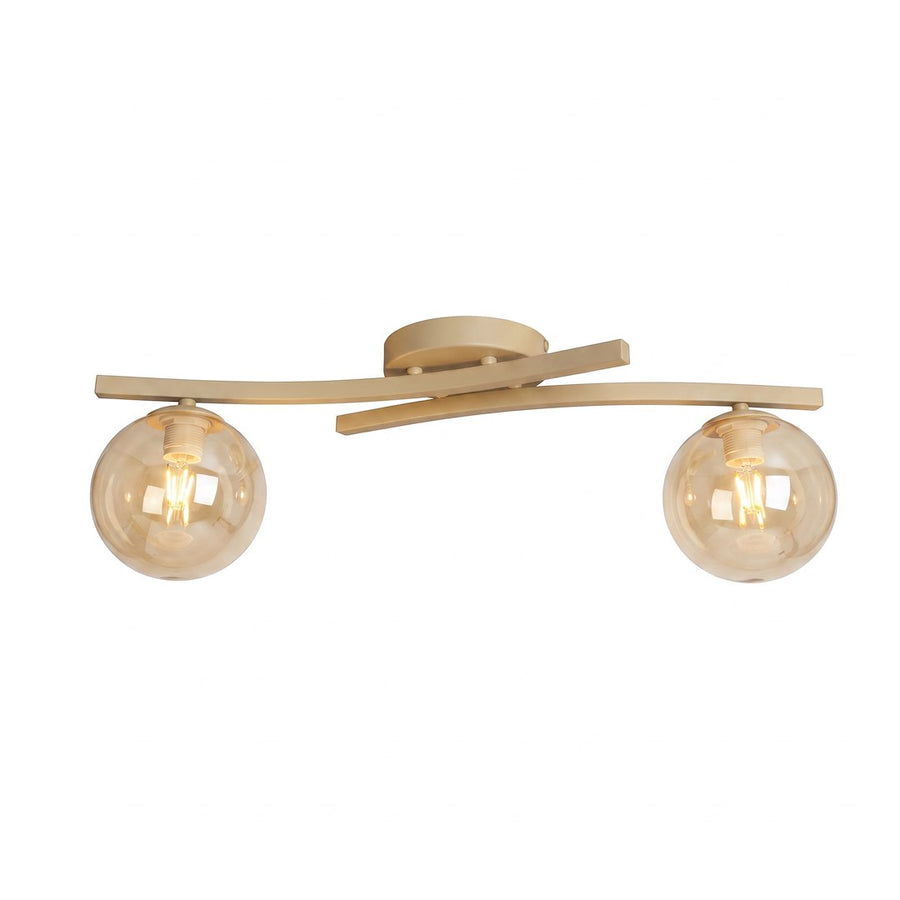 Second angle du luminaire, bras croisés en métal beige et diffuseurs sphériques allumés