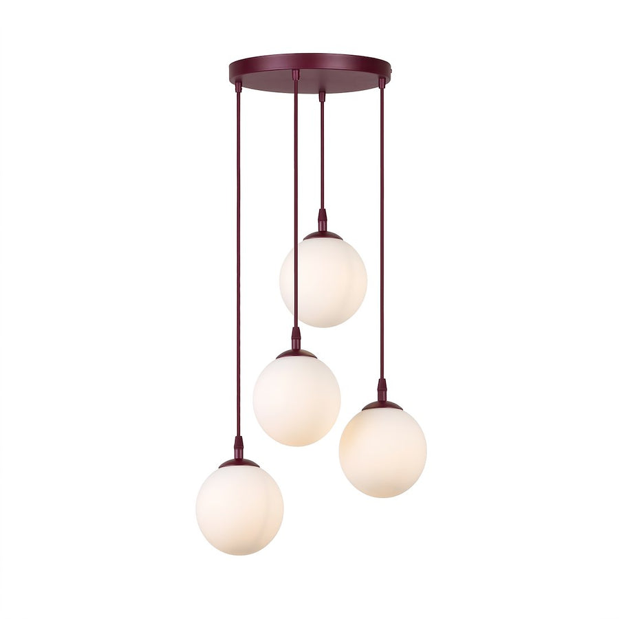 Luminaire sur fond blanc, quatre globes de verre blanc suspendus à une rosace bordeaux
