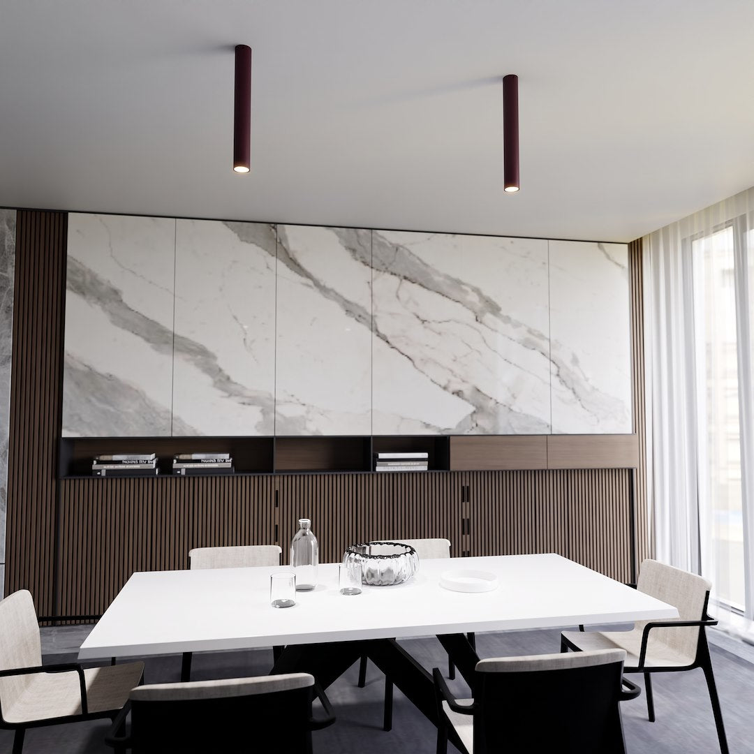 Mise en ambiance de deux plafonniers au-dessus d'une table de salle à manger