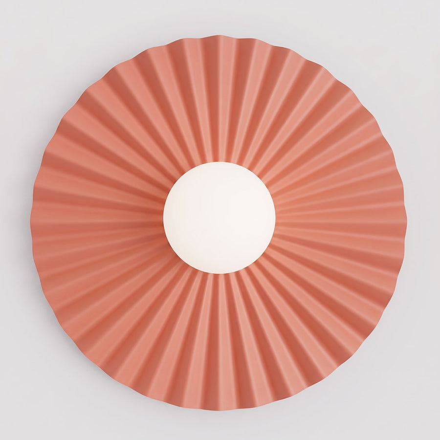 Vue de face du disque plissé corail avec globe blanc central