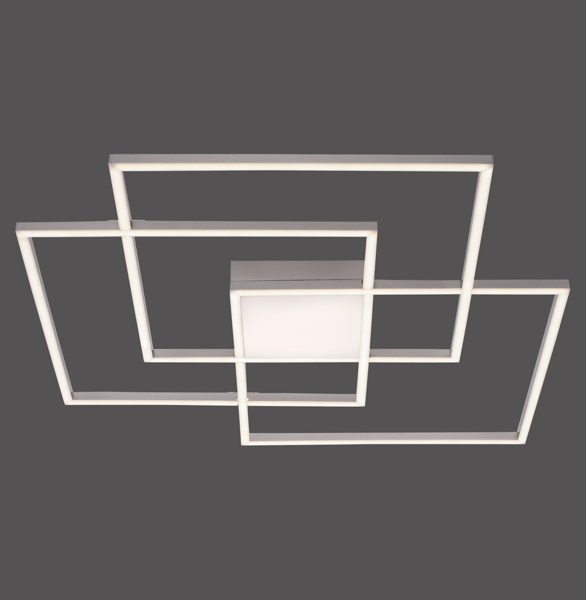 Plafonnier géométrique blanc avec cadres rectangulaires imbriqués et carré central.