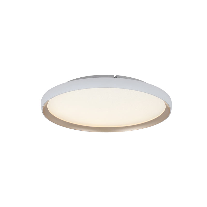 Luminaire présenté de biais sur fond blanc, profil mince et cerclage blanc.