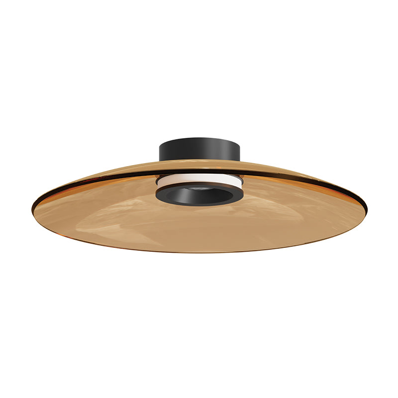 Vue légèrement inclinée du luminaire, dévoilant le disque de verre et le support central.