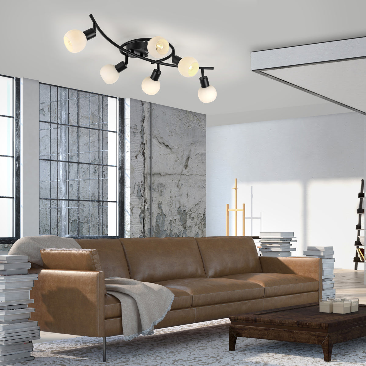 Mise en ambiance dans un salon moderne au canapé en cuir brun