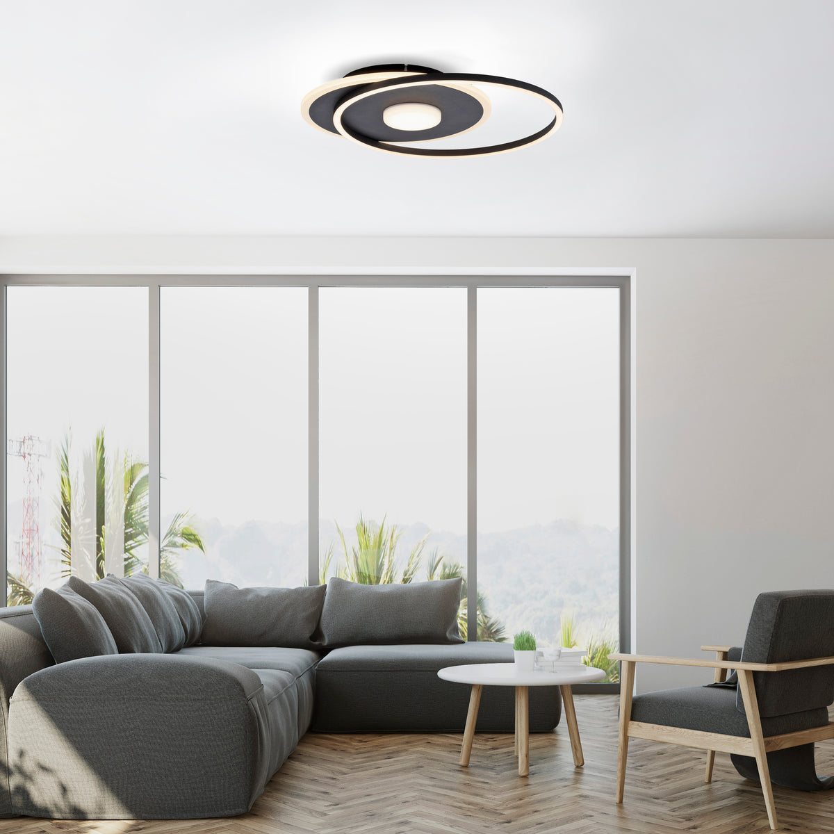 Mise en ambiance dans un salon moderne, plafonnier allumé fixé au plafond blanc