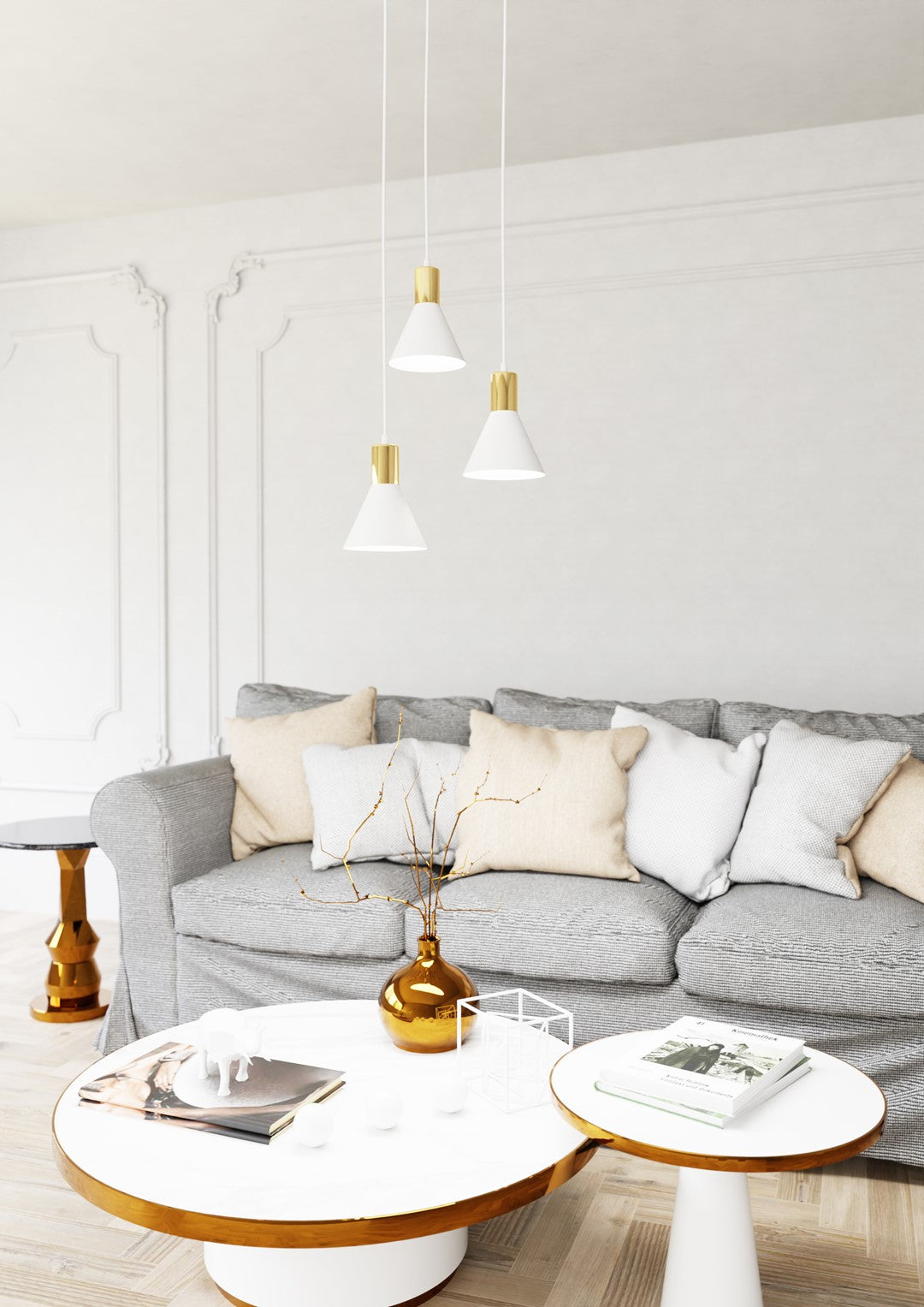 Luminaire installé dans un salon, canapé gris et tables rondes blanches