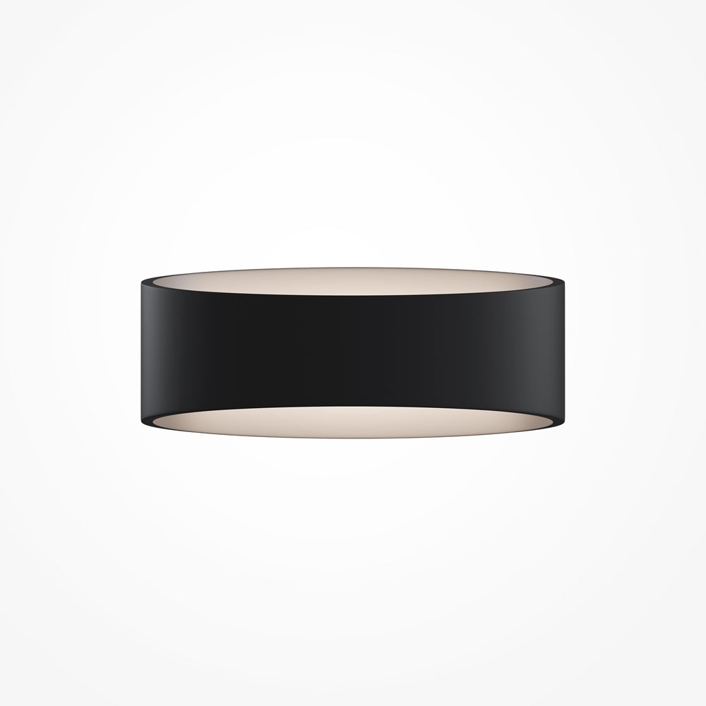 Version noire du luminaire cylindrique présentée de face sur fond blanc neutre