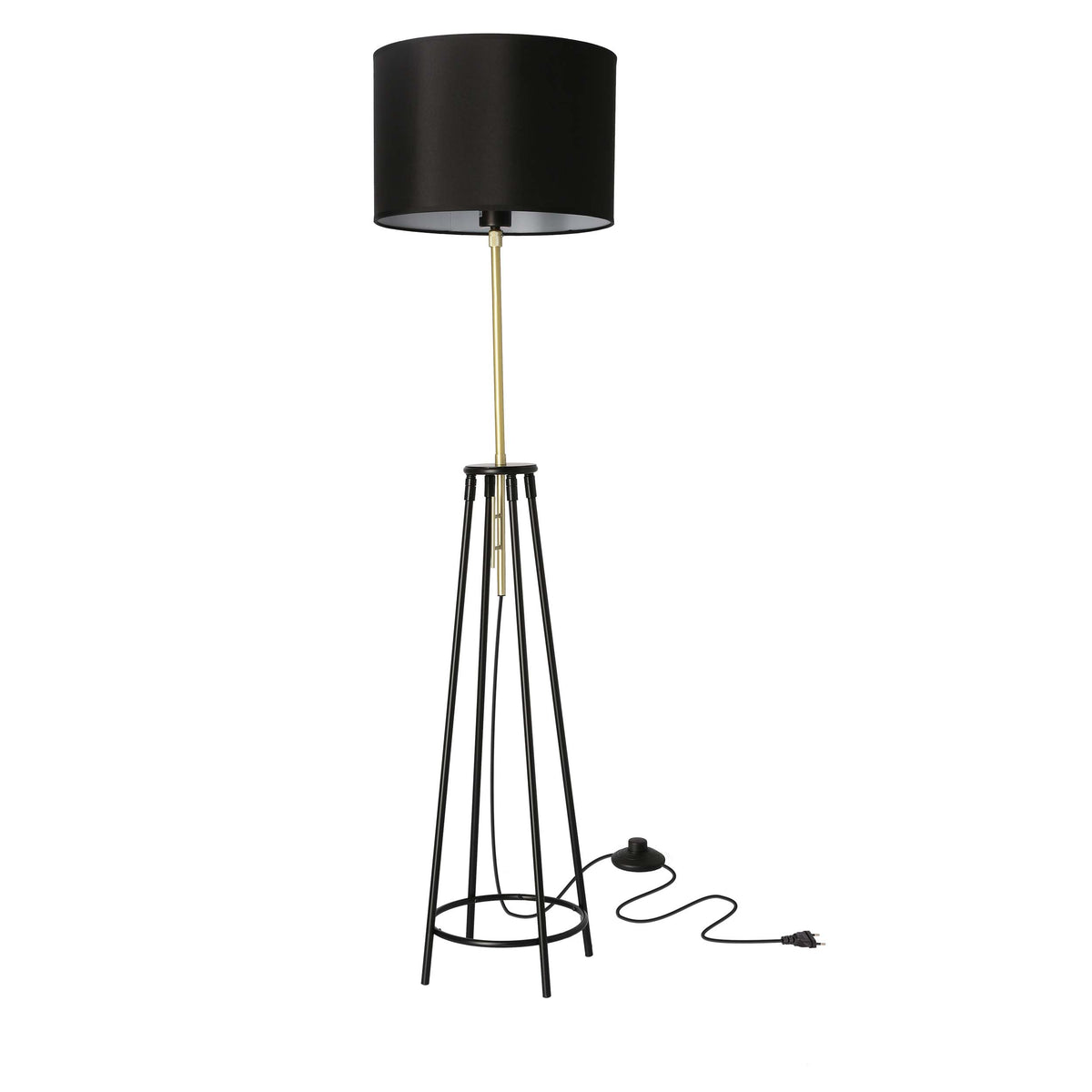 Lampadaire noir et doré sur fond blanc, abat-jour cylindrique et base trépied.