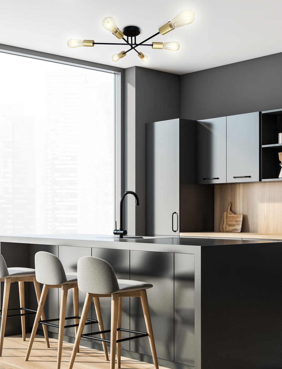 Luminaire fixé au plafond d'une cuisine moderne, îlot central et tabourets gris