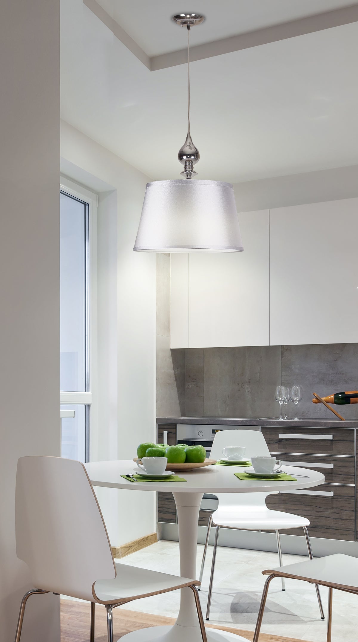 Vue en situation dans une cuisine moderne, au-dessus d'une petite table ronde blanche