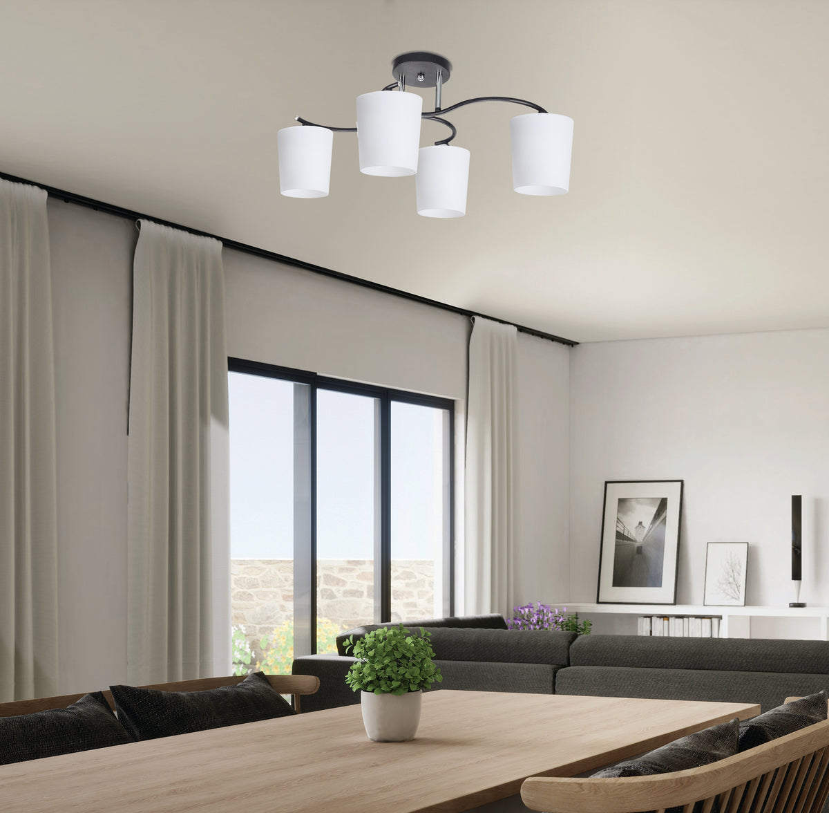 Mise en ambiance : plafonnier fixé au plafond au-dessus d'une table à manger