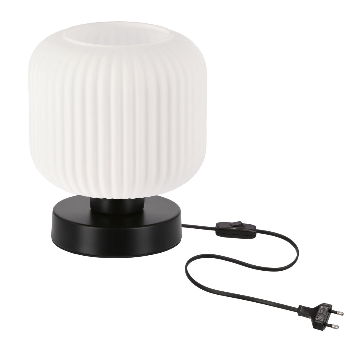Lampe à poser blanche à abat-jour côtelé sur socle noir, câble et interrupteur