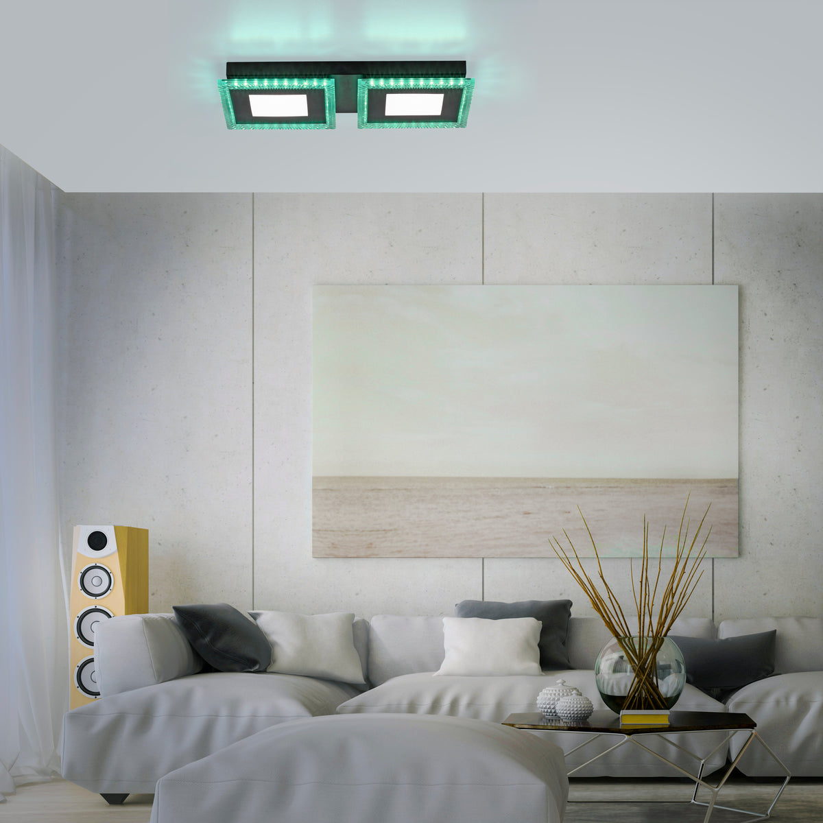 Mise en ambiance dans un salon moderne, plafonnier allumé en vert au plafond