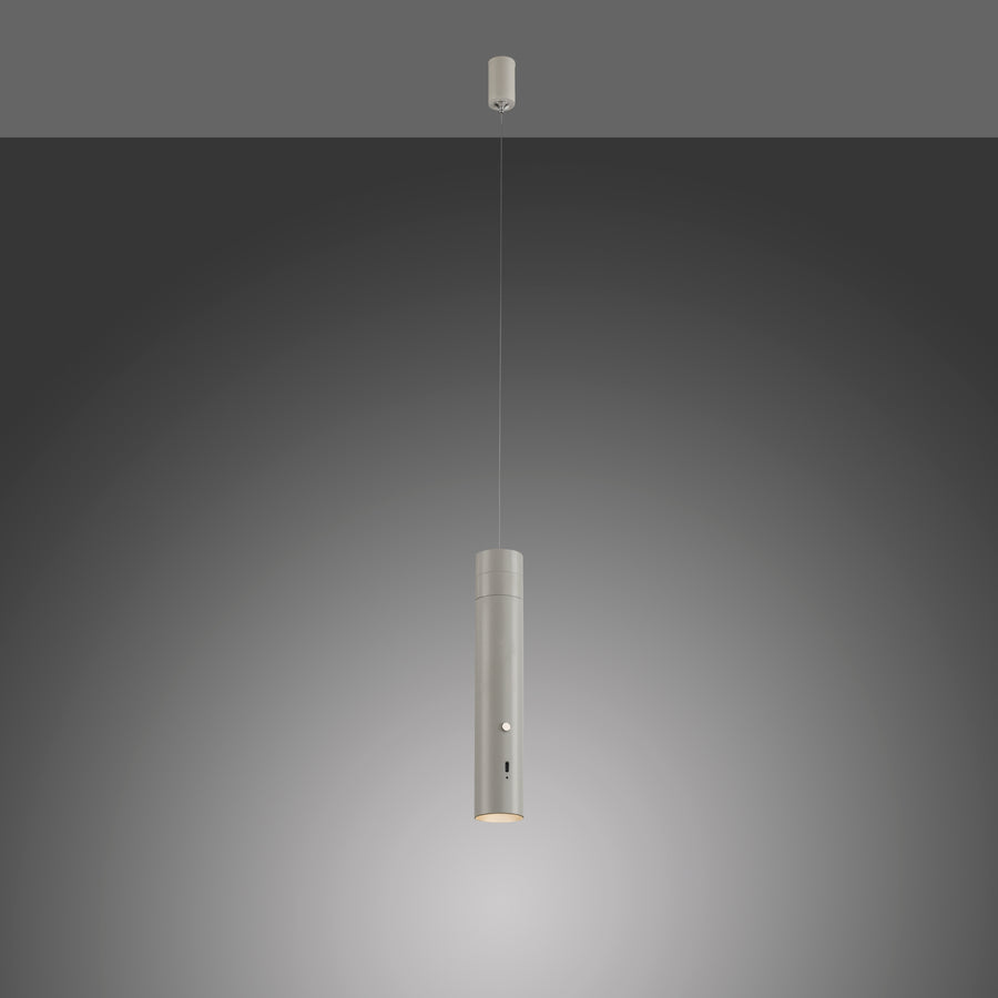 Luminaire suspendu gris éclairé sur fond dégradé sombre, lumière allumée.