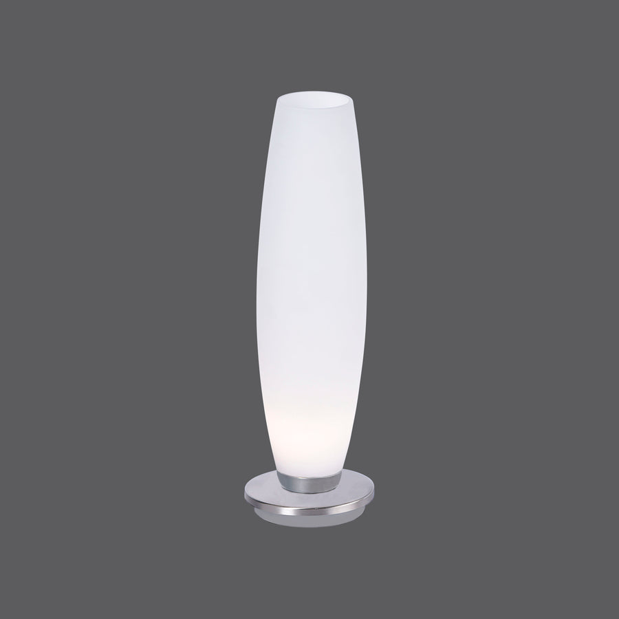 Lampe à poser de face sur fond gris, verre dépoli et base ronde en acier.