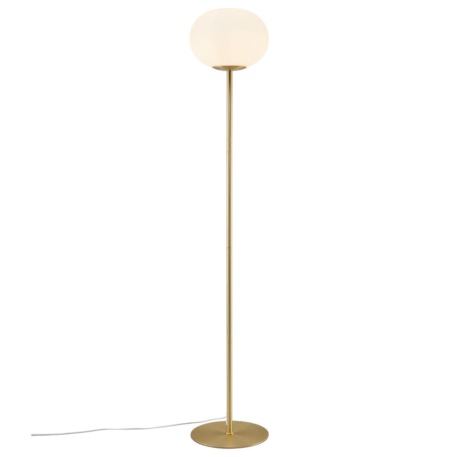 Lampadaire de face sur fond blanc, tige laiton et globe de verre