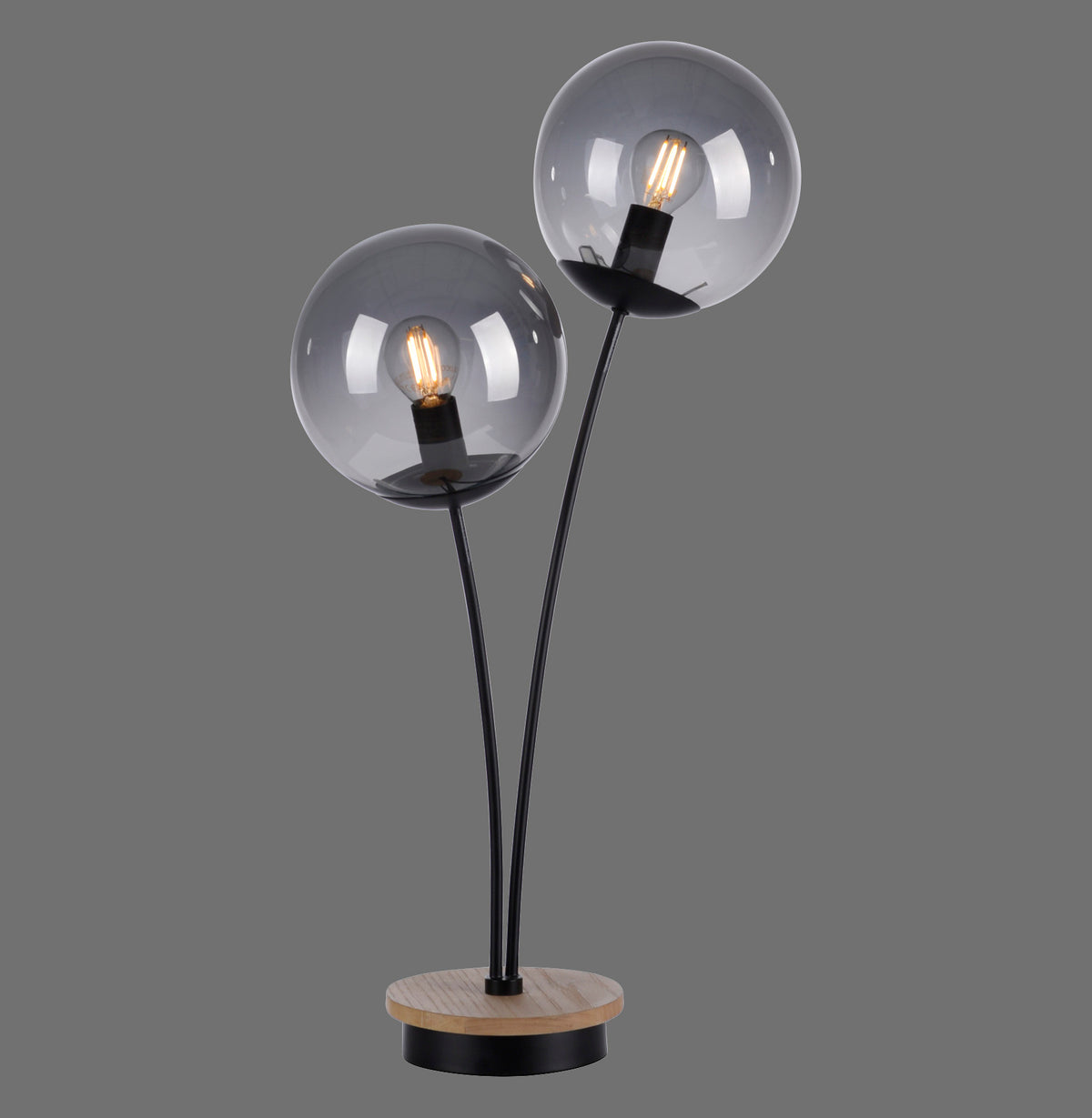 Lampe à poser noire avec deux globes en verre fumé et base ronde en bois clair
