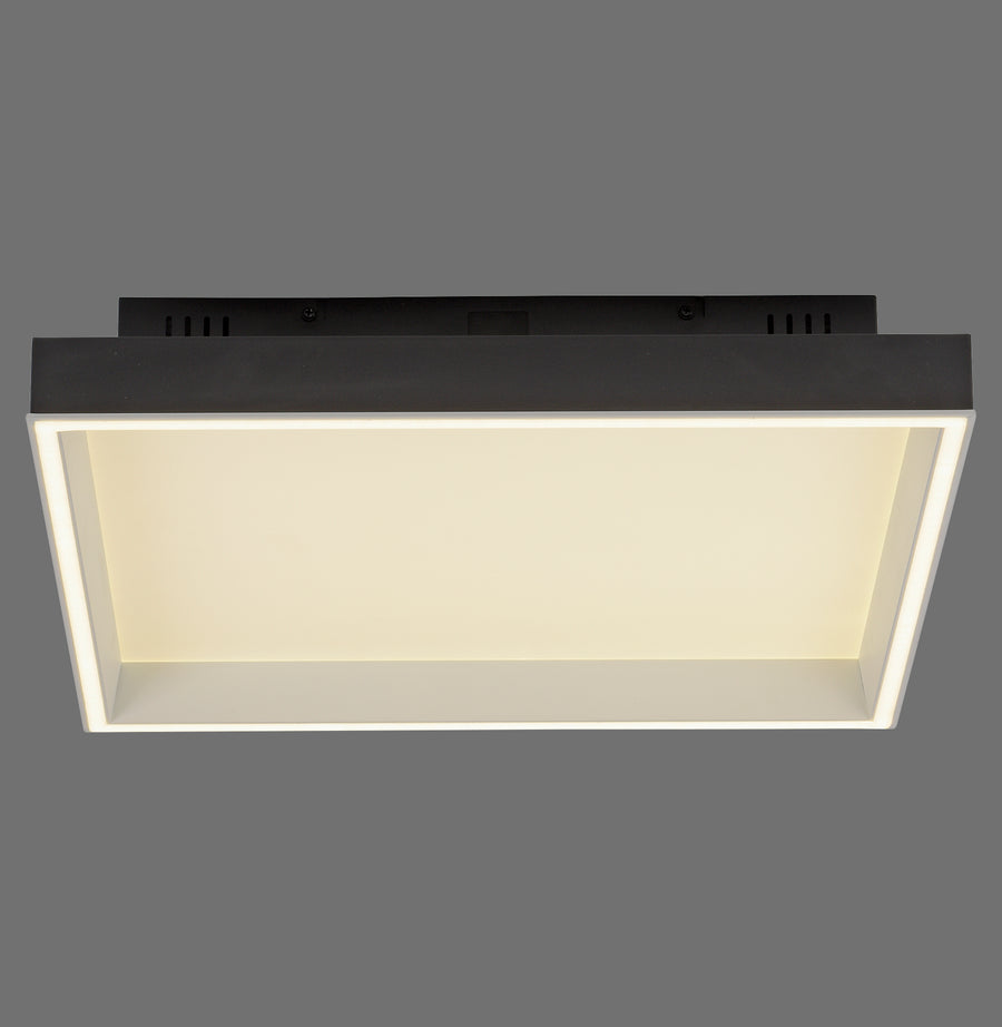 Plafonnier rectangulaire noir vu de face, diffuseur blanc opalin largement allumé