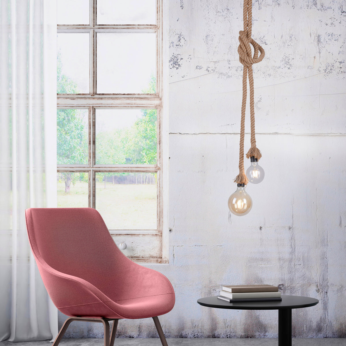 Mise en ambiance dans un salon, fauteuil rose et fenêtre, suspension en corde