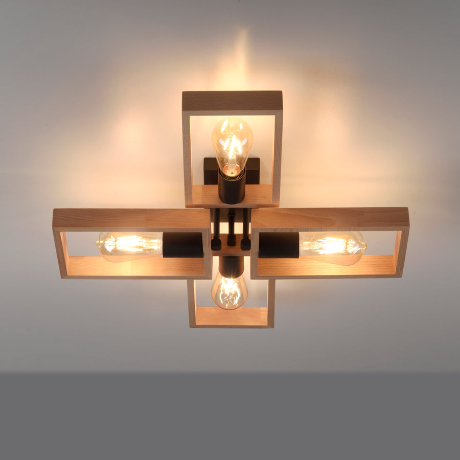 Plafonnier allumé au plafond, halo lumineux diffusé sur le mur blanc