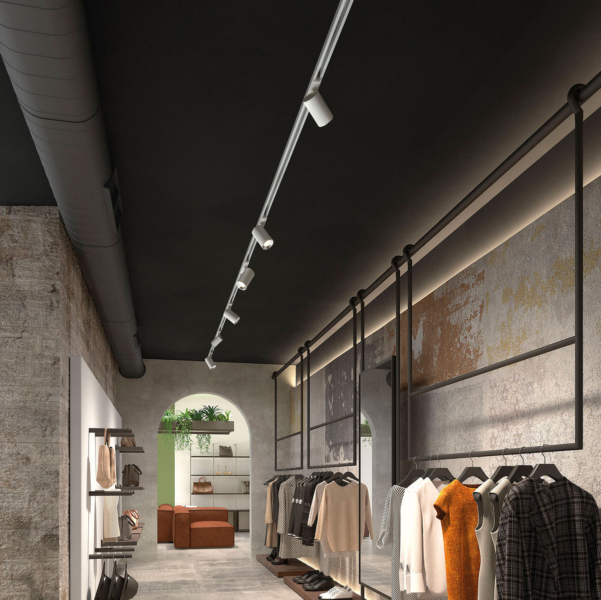 Mise en ambiance du luminaire dans une boutique de vêtements moderne.