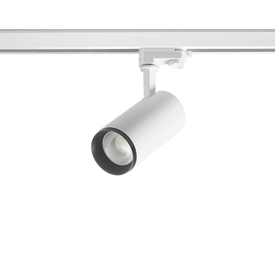 Spot blanc sur rail, orientable, vu de trois quarts avec LED intégrée visible.