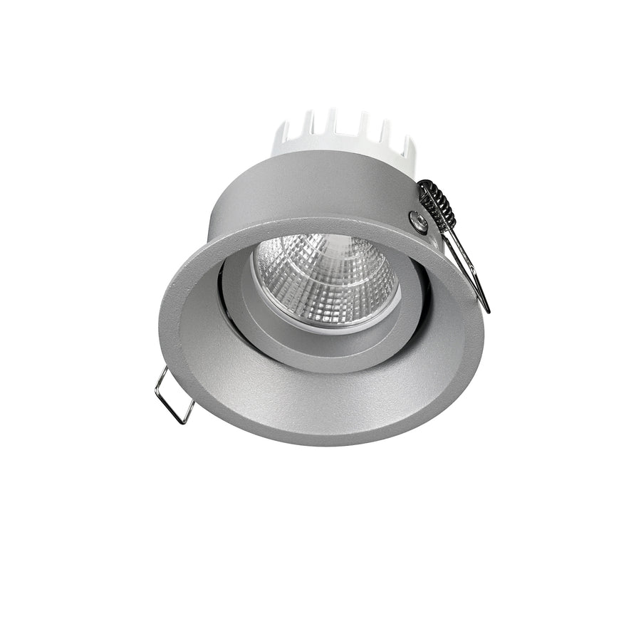Version grise du spot rond, collerette et module orientable avec lentille striée apparente.