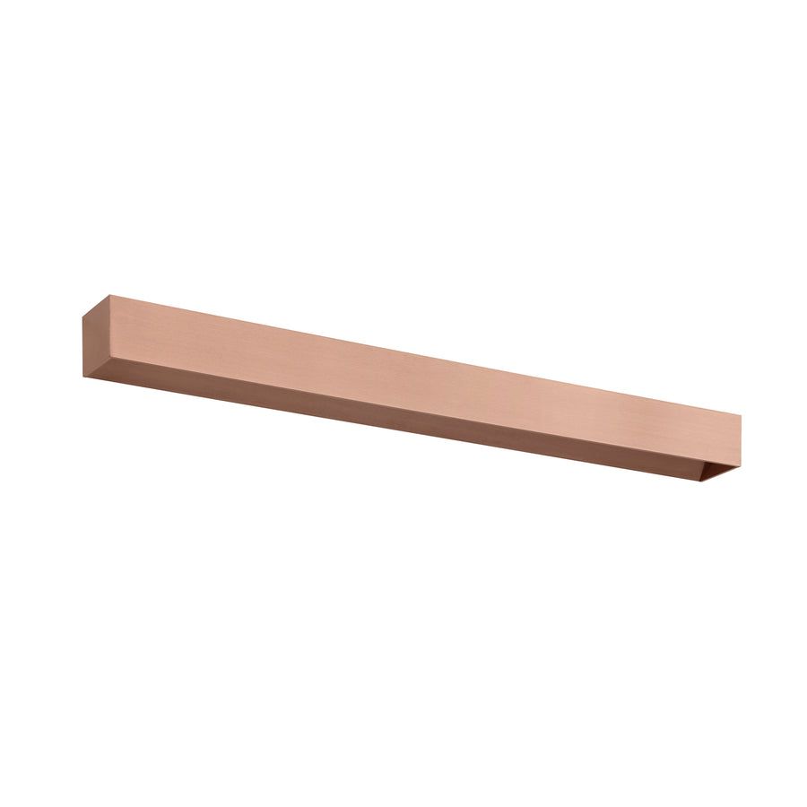 Version cuivrée du luminaire mural, barre rectangulaire présentée sur fond neutre