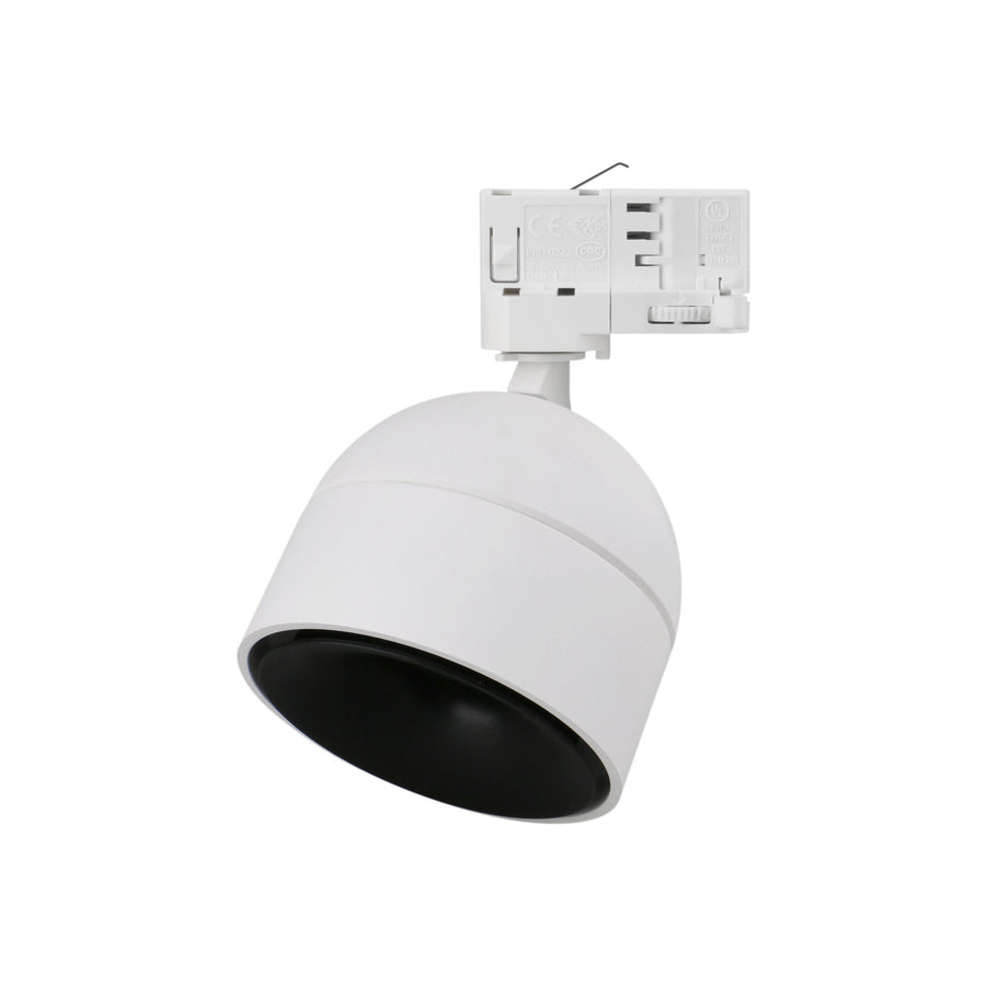 Spot blanc incliné, intérieur noir visible, adaptateur de rail blanc au-dessus.