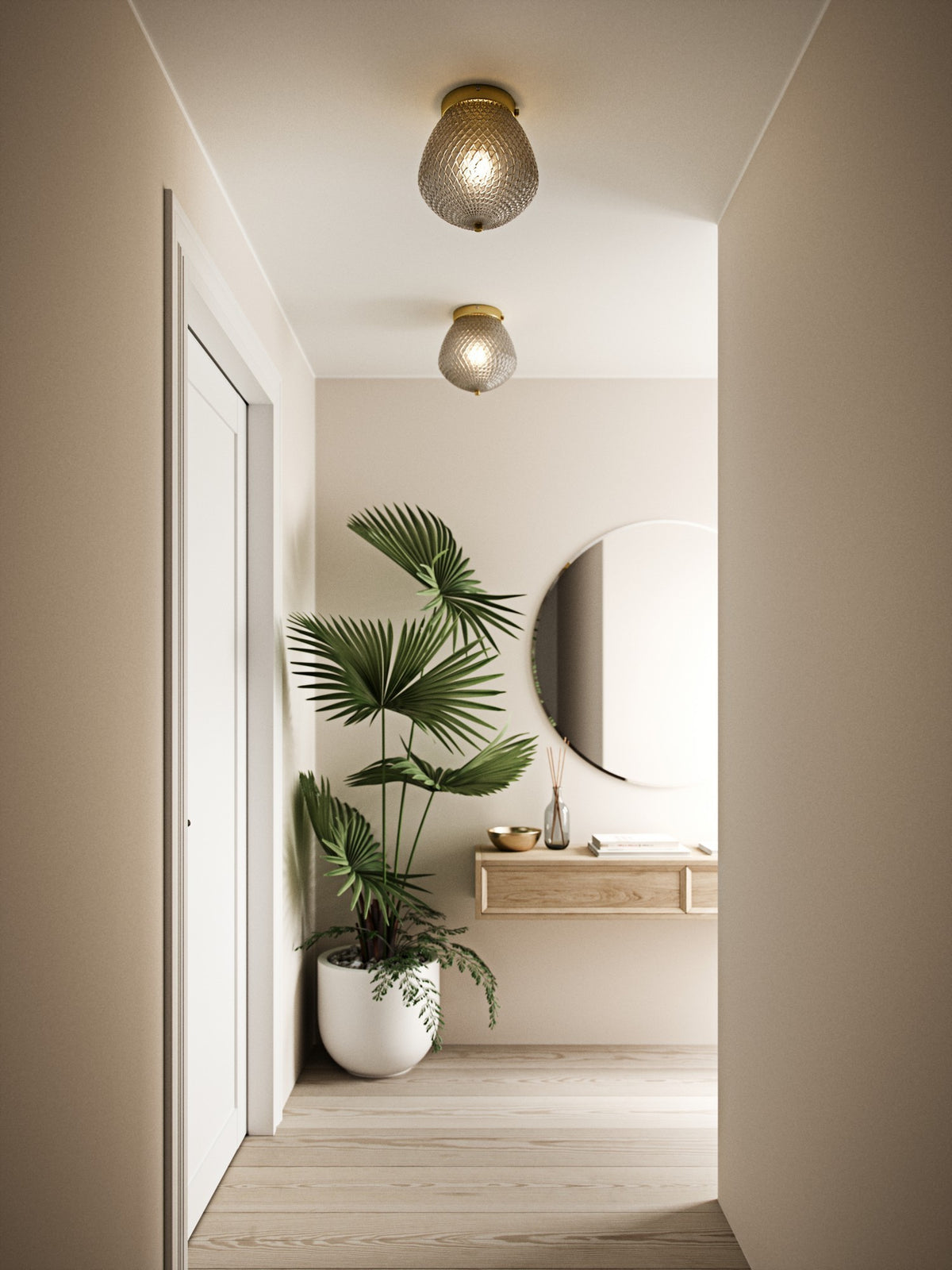 Deux plafonniers identiques éclairant un couloir clair avec plante et miroir