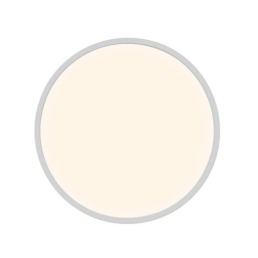Vue de face du plafonnier rond blanc, surface lumineuse uniforme et bord discret
