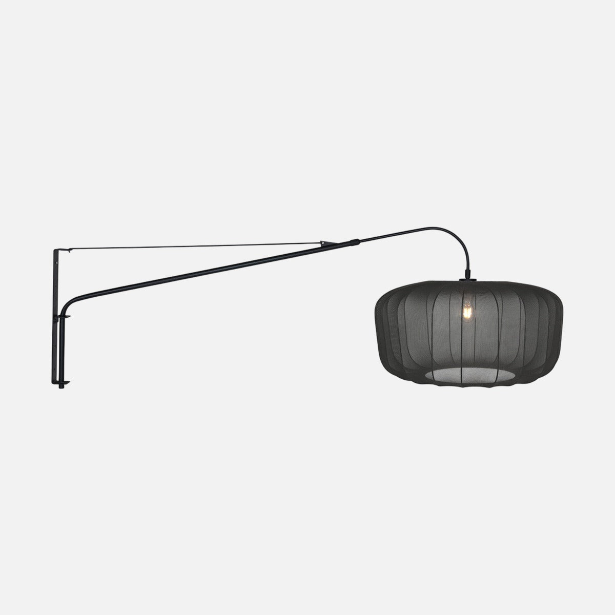 Applique murale à bras articulé noir Sparkled, abat-jour voile noir tambour, sur fond gris clair – Designix.fr