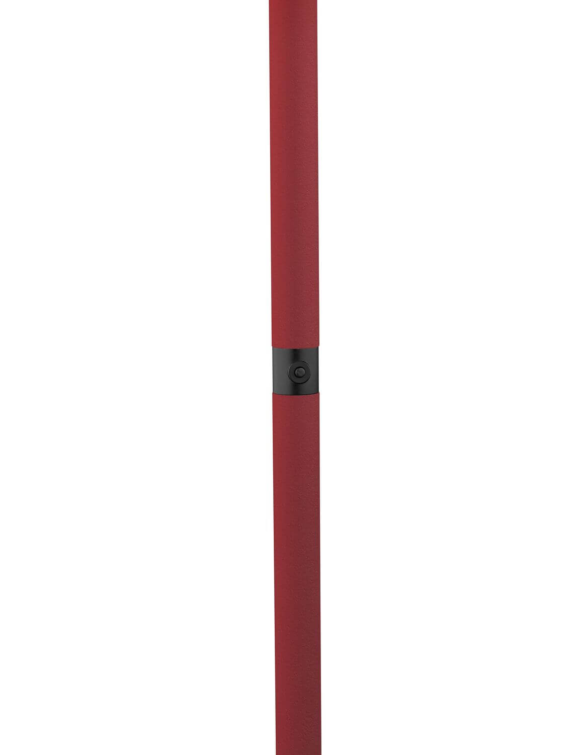 Détail du fût rouge, bague noire et bouton central, en gros plan vertical.