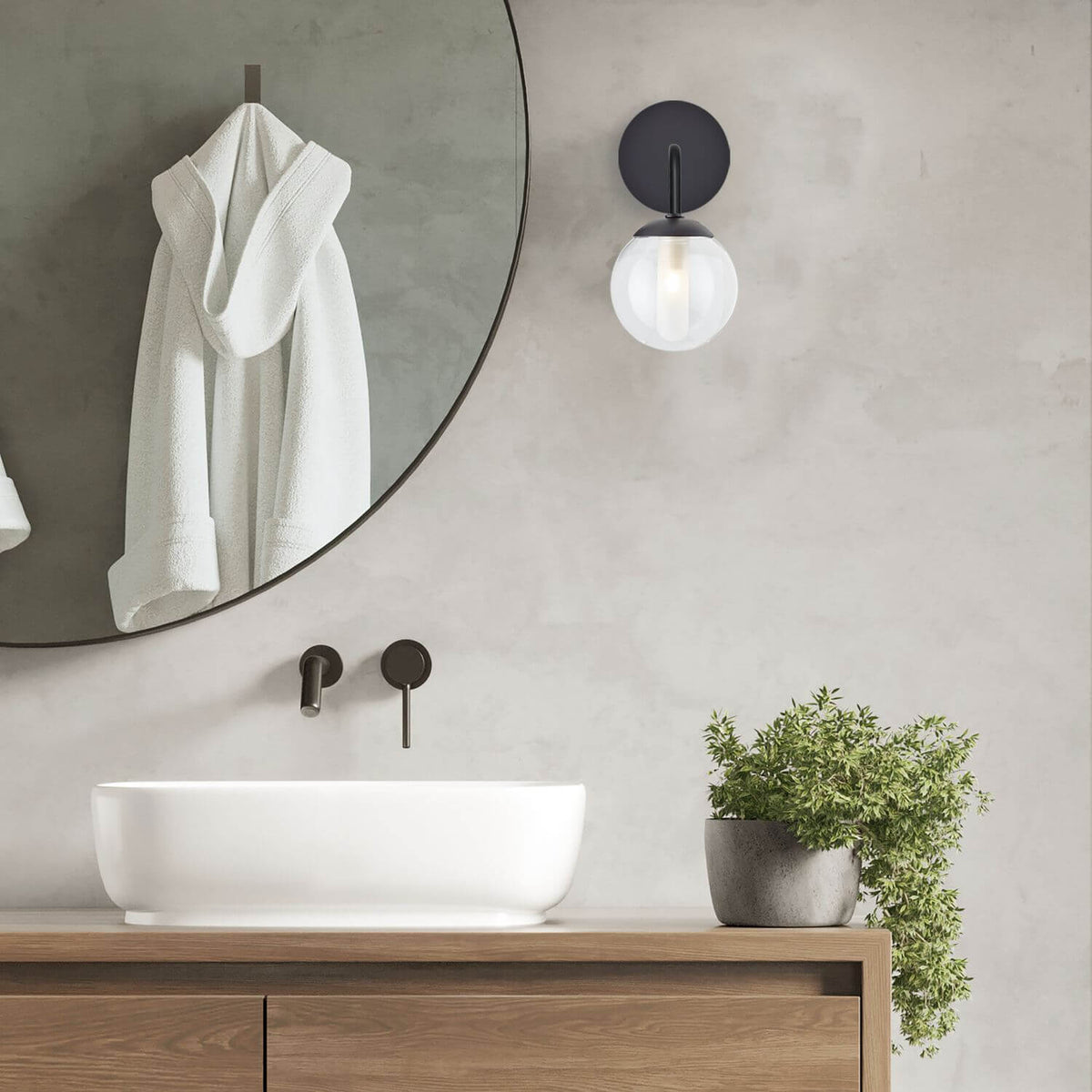 Mise en ambiance de l'applique murale dans une salle de bain au-dessus du lavabo