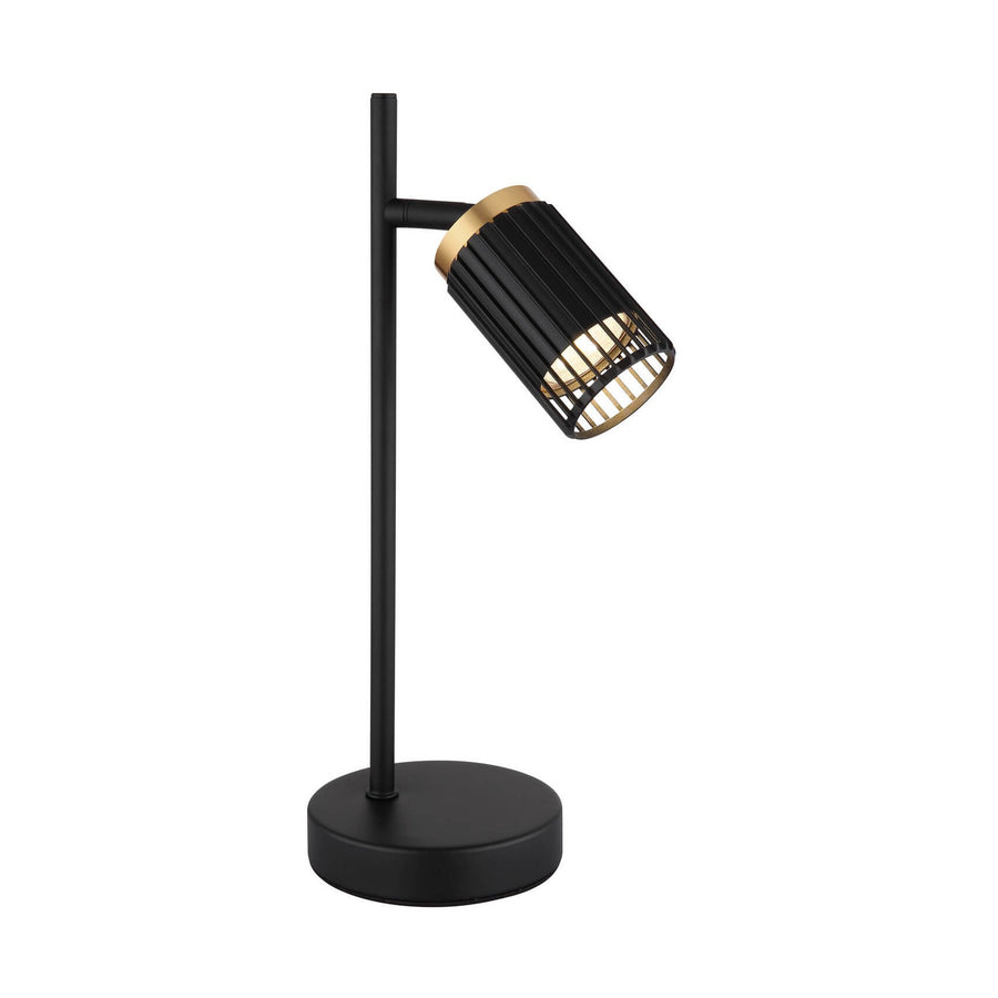 Lampe de table noire mate, abat-jour cylindrique ajouré incliné, fond blanc neutre