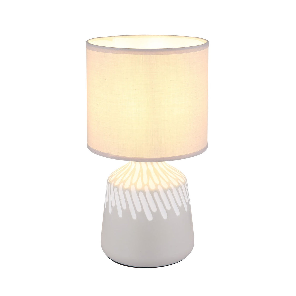 Lampe à poser de face avec abat-jour cylindrique beige et pied céramique clair