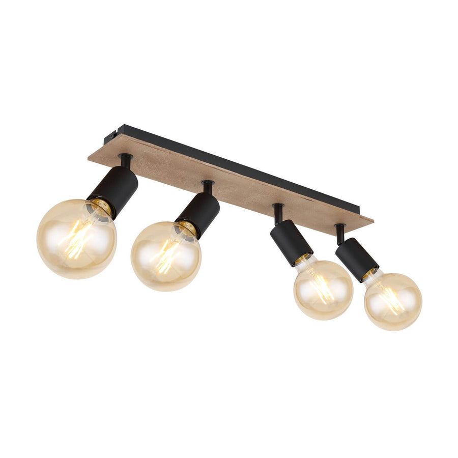 Luminaire quatre spots noirs et ampoules rondes dorées sur fond blanc